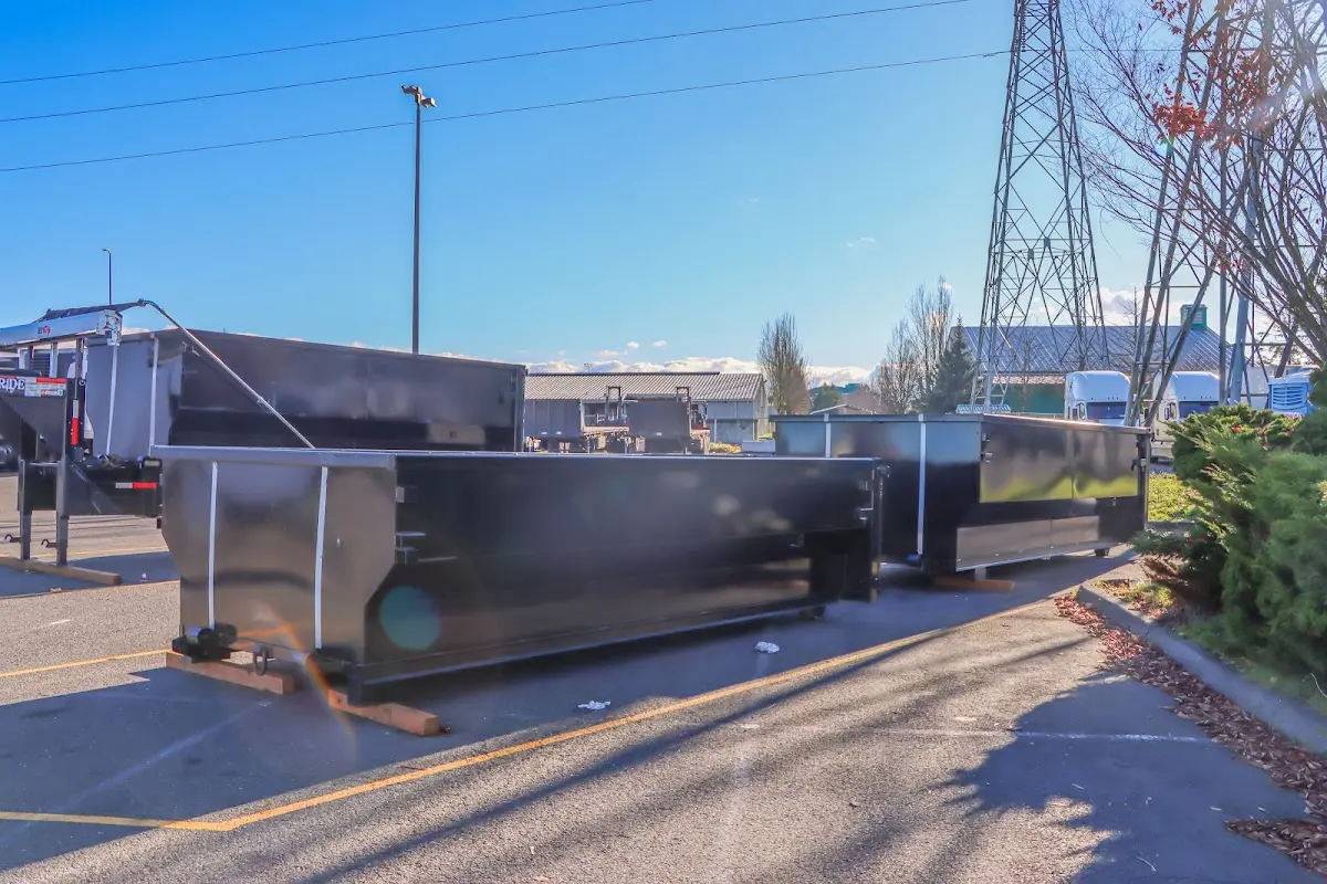Roll-off dumpster ready for waste disposal at job site for Concrete Dumpster Rental in West Hattiesburg